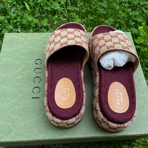 Brand new Gucci women’s GG platform slide sandals.
